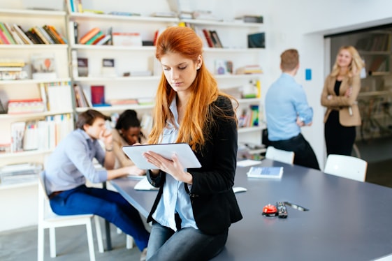 Digital transformation leader working with tablet in modern workplace